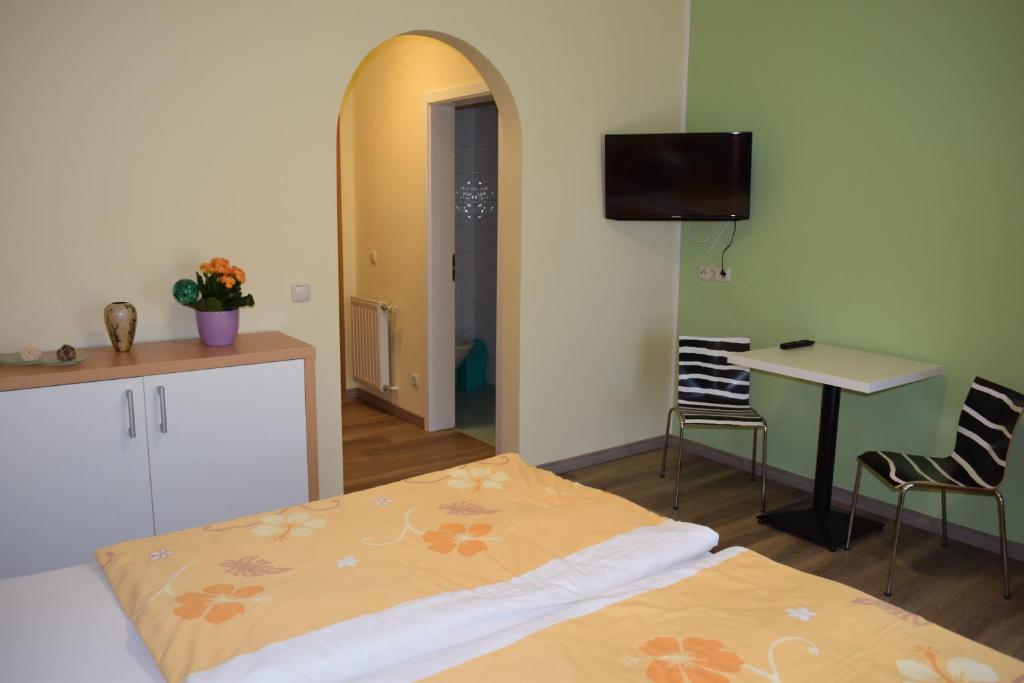 Posteľ alebo postele v izbe v ubytovaní Gästehaus Sabina- Frühstückspension, Bed & Breakfest