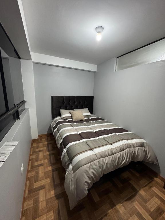 Ένα ή περισσότερα κρεβάτια σε δωμάτιο στο Baloo House