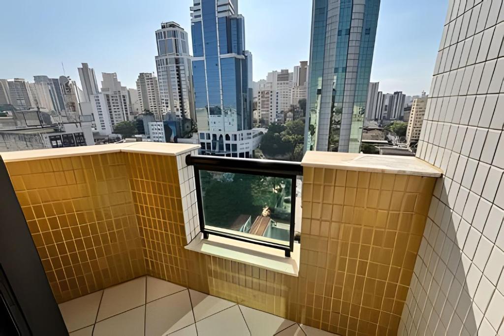 Μπαλκόνι ή βεράντα στο Flat ótima localização com vaga