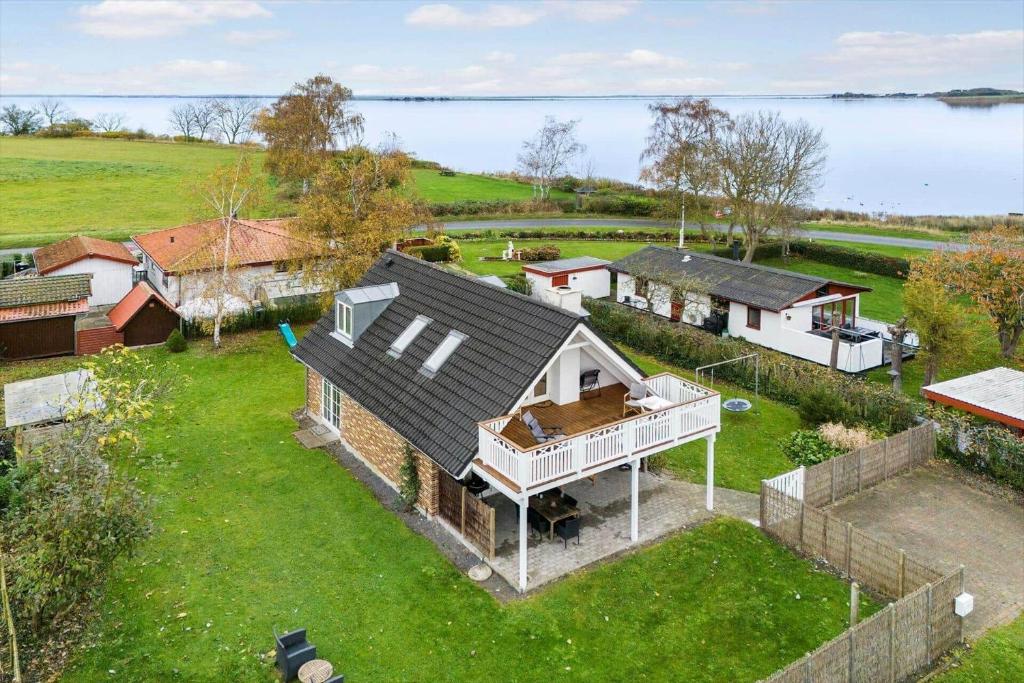an aerial view of a house in a field at AE285-Aeroskobing-Hanses-Ager-4 in Ærøskøbing