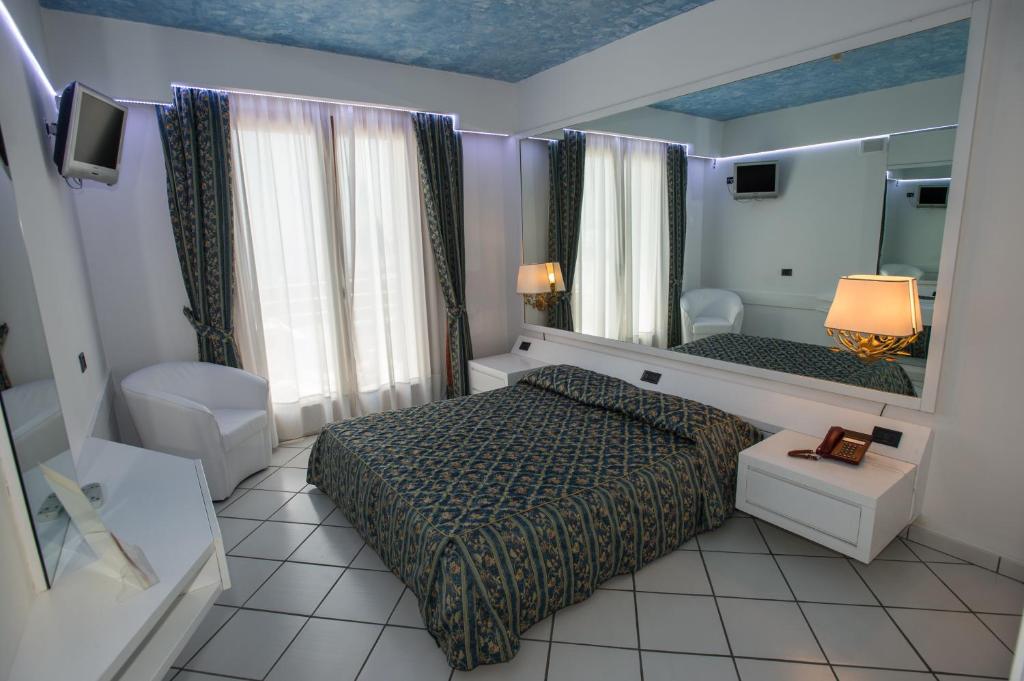 Postel nebo postele na pokoji v ubytování Hotel Ristorante Panoramico
