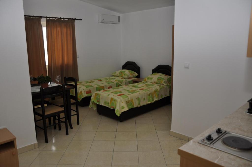 Postel nebo postele na pokoji v ubytování Guest House Lalic