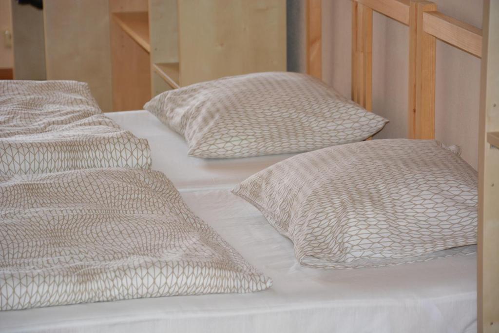 Postel nebo postele na pokoji v ubytování Apartments 163/I
