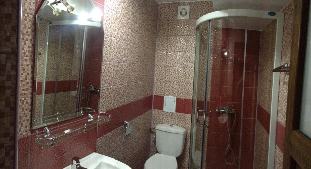 Koupelna v ubytování Hotel Marinii