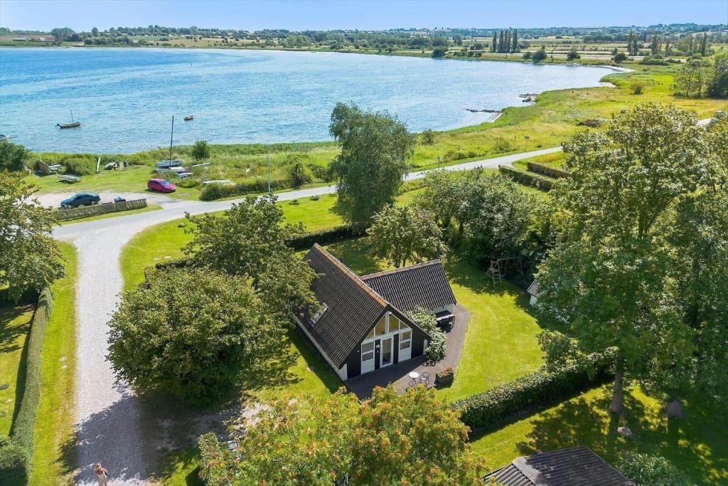 an aerial view of a house next to the water at AE240-Aeroskobing-Hanses-Ager-1 in Ærøskøbing
