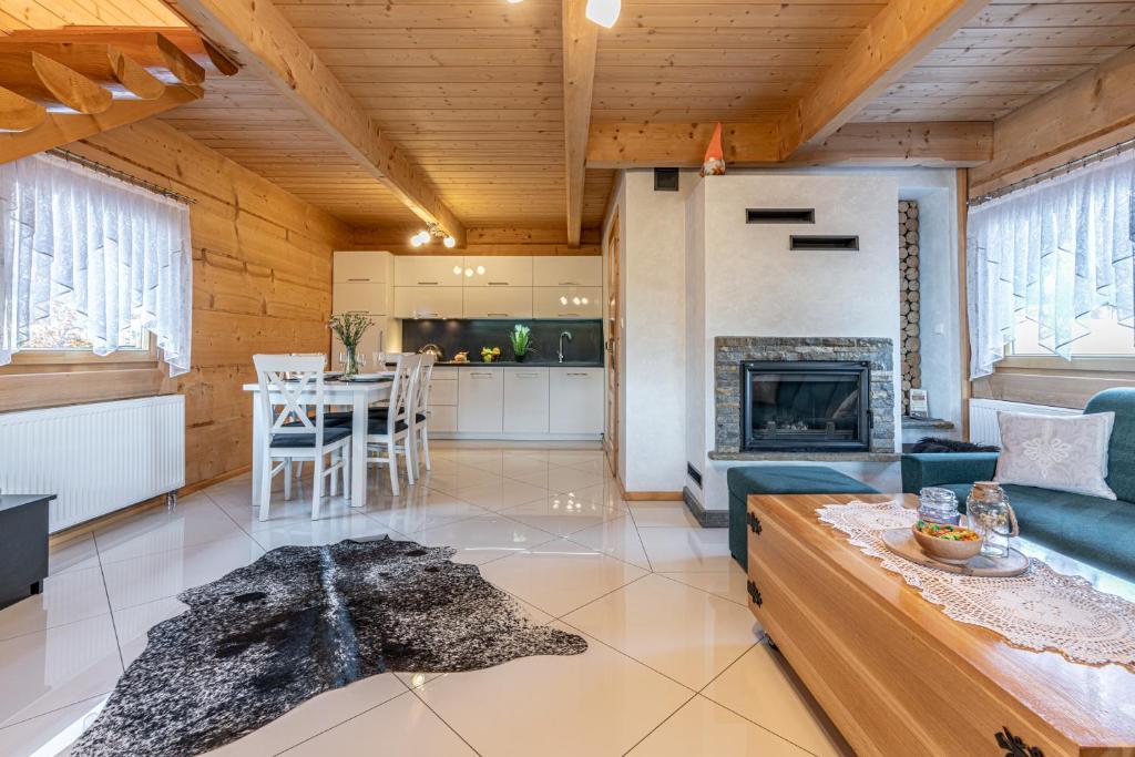Osada Szaflary - jacuzzi na wyłączność dla każdego domku, ogólnodostępna sauna i plac zabaw w cenie - Chalet Met 2 Slaapkamers