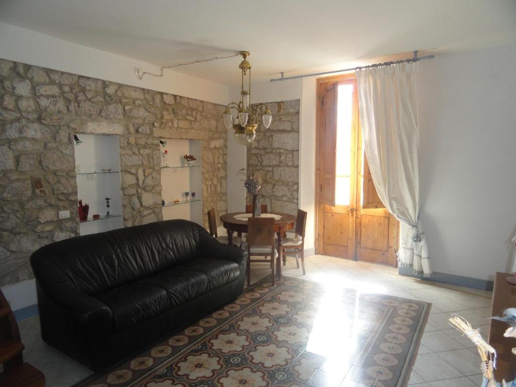 Posedenie v ubytovaní Appartamento Casa Tonina
