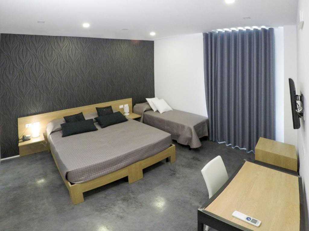 Posteľ alebo postele v izbe v ubytovaní Abraxia Guest House