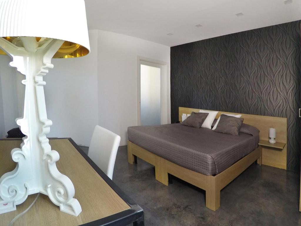 Posteľ alebo postele v izbe v ubytovaní Abraxia Guest House