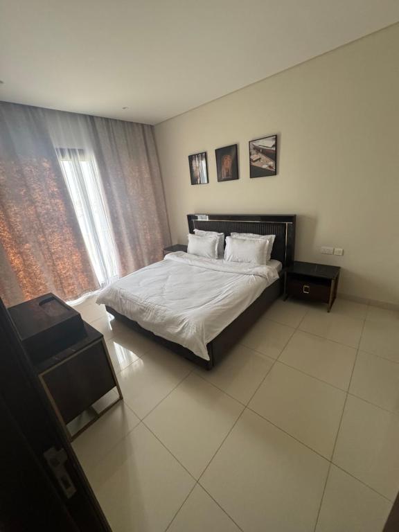 Postel nebo postele na pokoji v ubytování Hawana salalah L6TH04