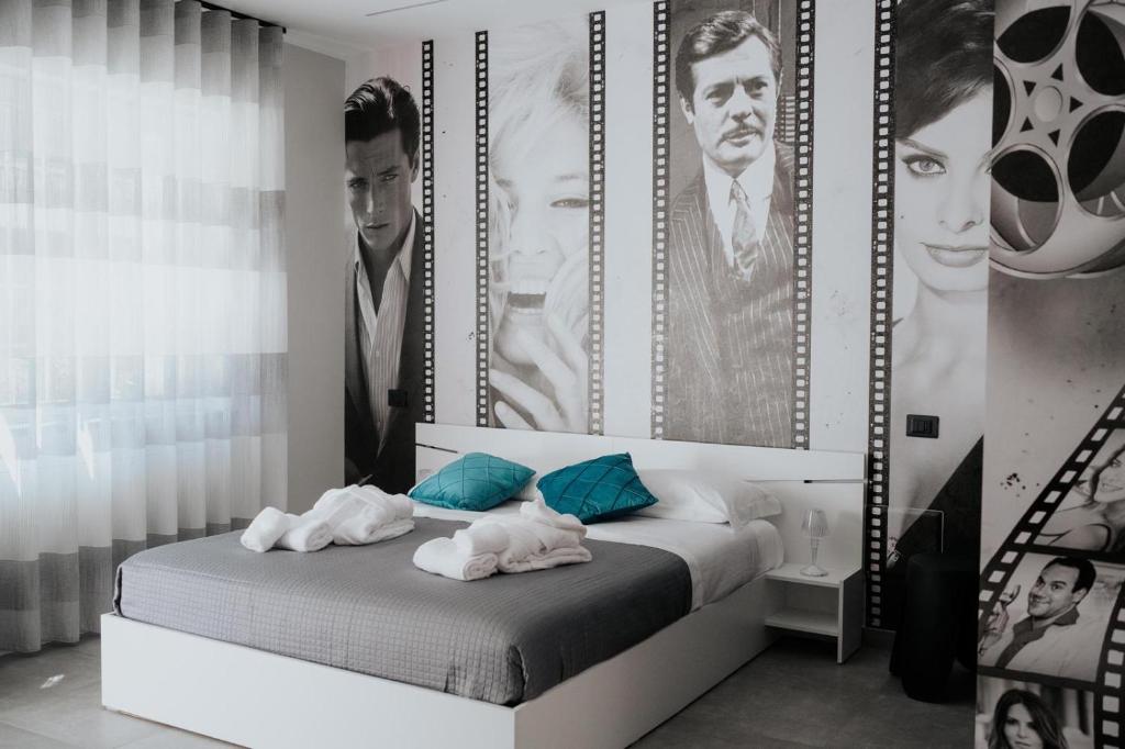 Postel nebo postele na pokoji v ubytování Guest Star Apartments