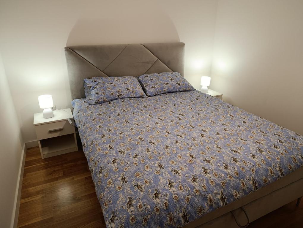 Postel nebo postele na pokoji v ubytování Apartman ANATEO Istocno Sarajevo