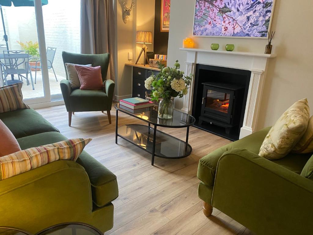 Posezení v ubytování Garden Flat