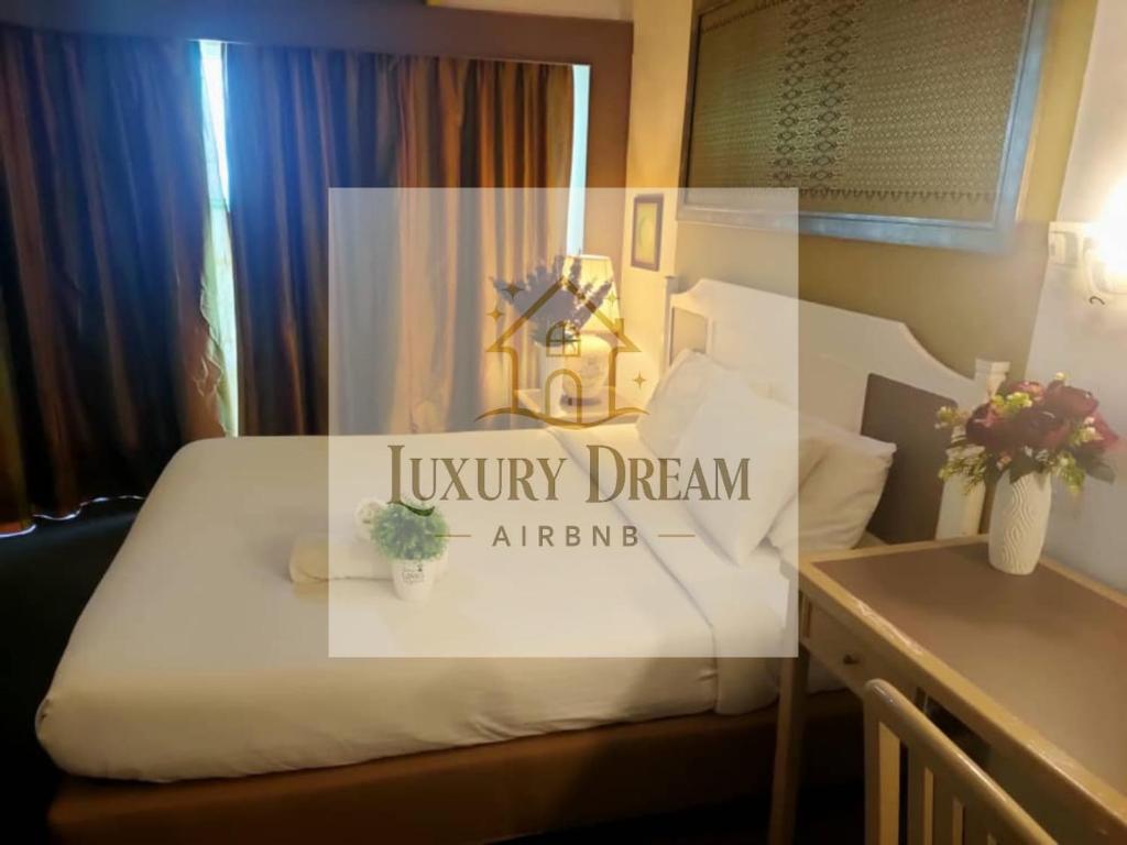 Ένα ή περισσότερα κρεβάτια σε δωμάτιο στο Luxury Dream Seaview