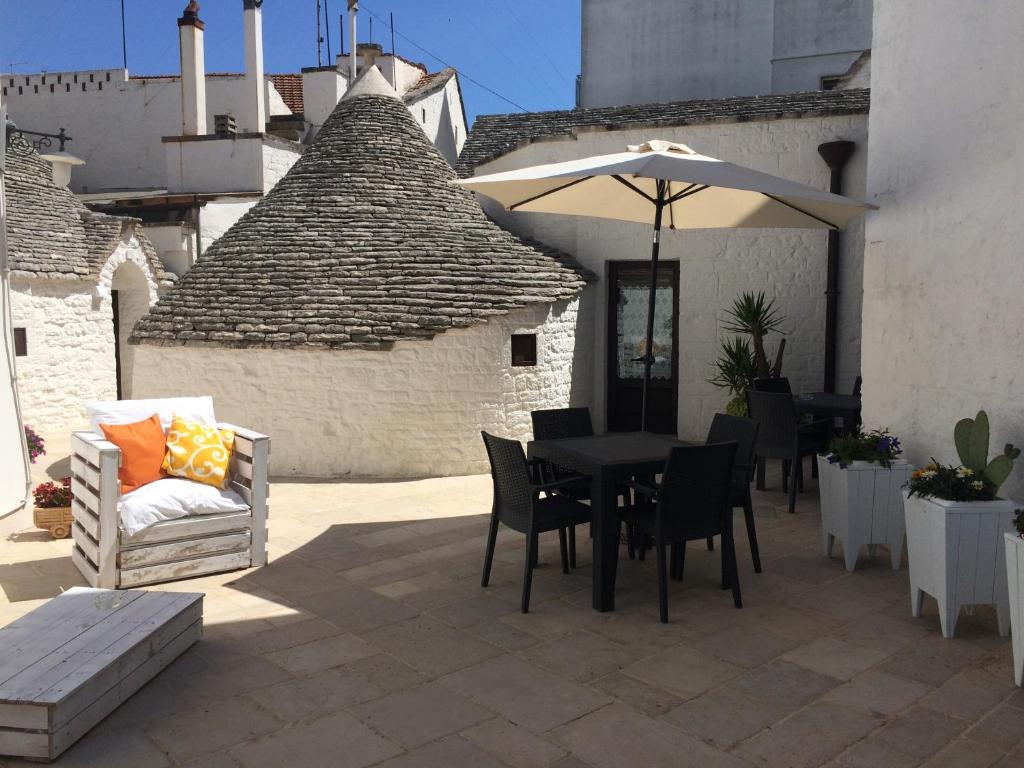 A patio or other outdoor area at Trulli Family - Trulli&Cummerse