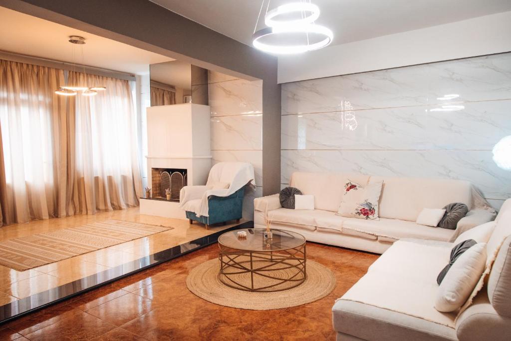 Predel za sedenje v nastanitvi Luxury Suite Prada