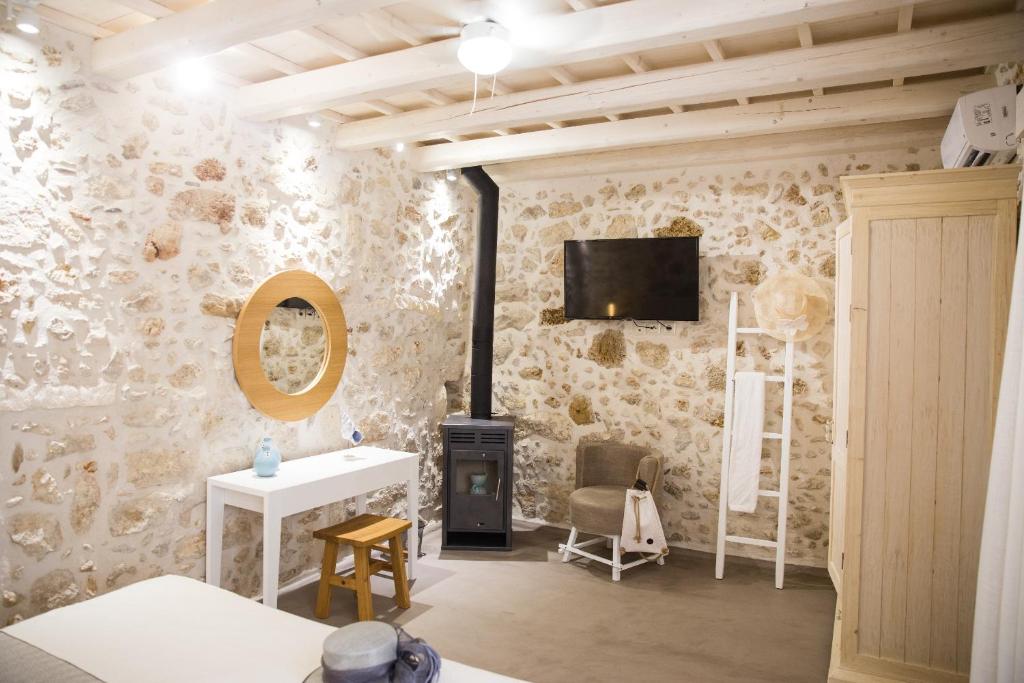 Televízia a/alebo spoločenská miestnosť v ubytovaní AC Homes Alice