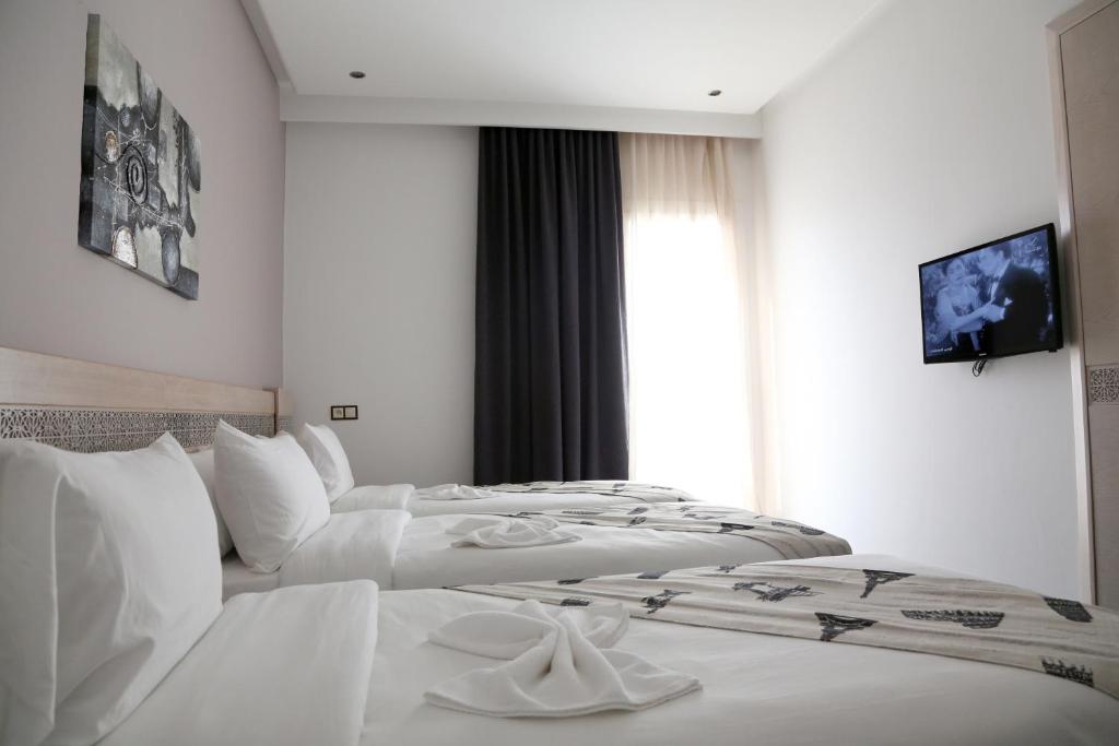 Voodi või voodid majutusasutuse Hotel A44 toas