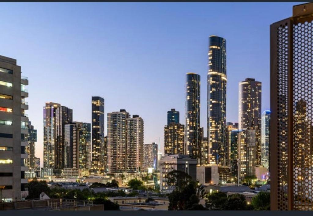 a view of a city skyline with tall buildings at City Vibe on Dorcas Southbank in Melbourne