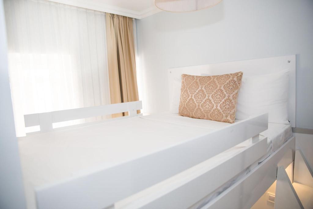 Postel nebo postele na pokoji v ubytování Lavanta Hotel