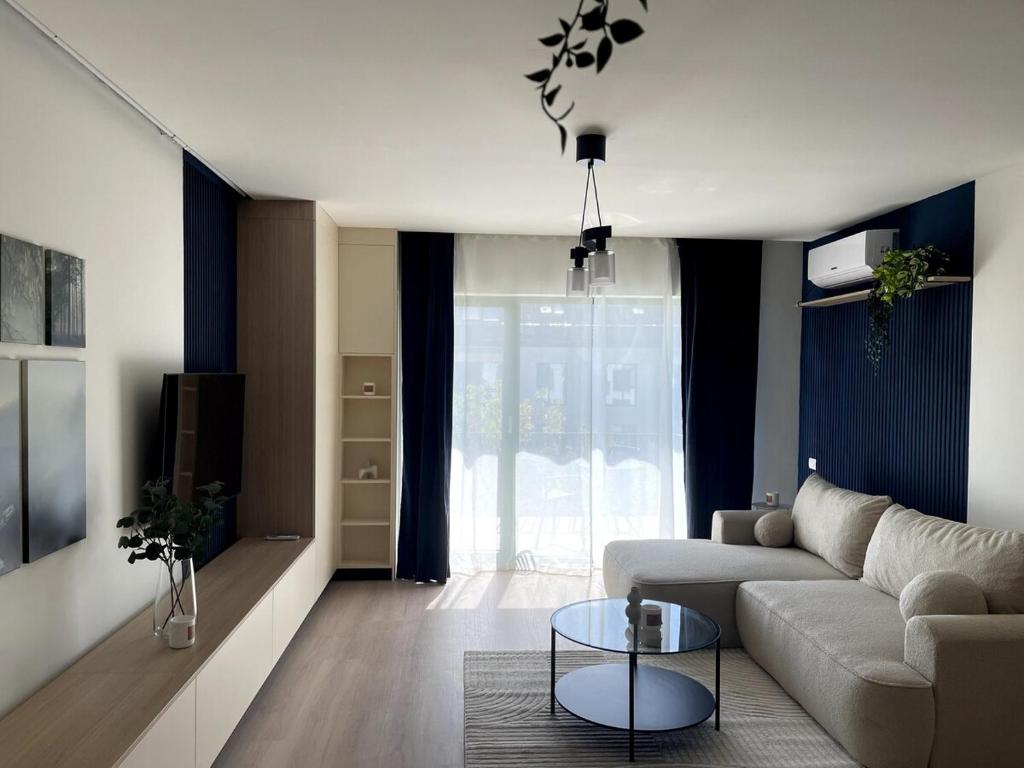 TV a/nebo společenská místnost v ubytování The Lake Home B1, Ap 29