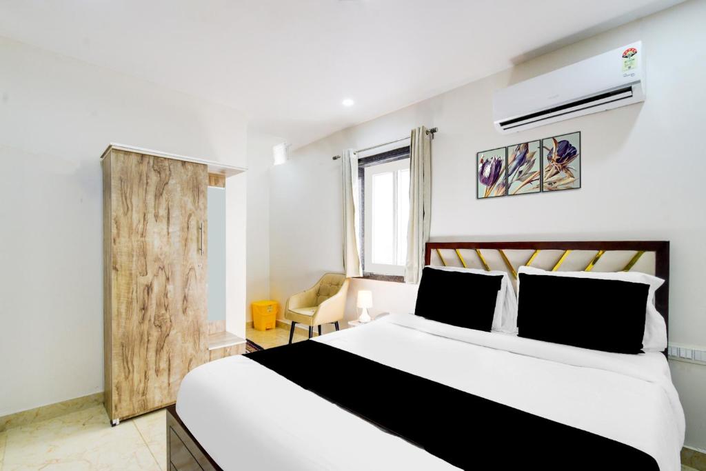 Postel nebo postele na pokoji v ubytování Hotel O Skyline