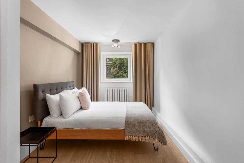 Postel nebo postele na pokoji v ubytování Belgravia Living