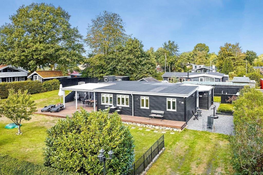 an aerial view of a house with a yard at 30355-Odder-Granvej-14 in Odder