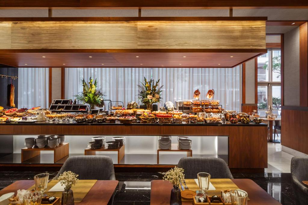 A generously styled buffet counter displaying a broad spread of breakfast foods.