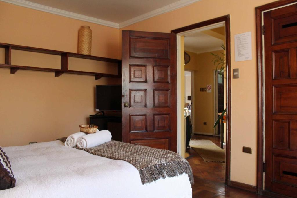 Postel nebo postele na pokoji v ubytování Hotel Boutique Terra Diaguita & Spa