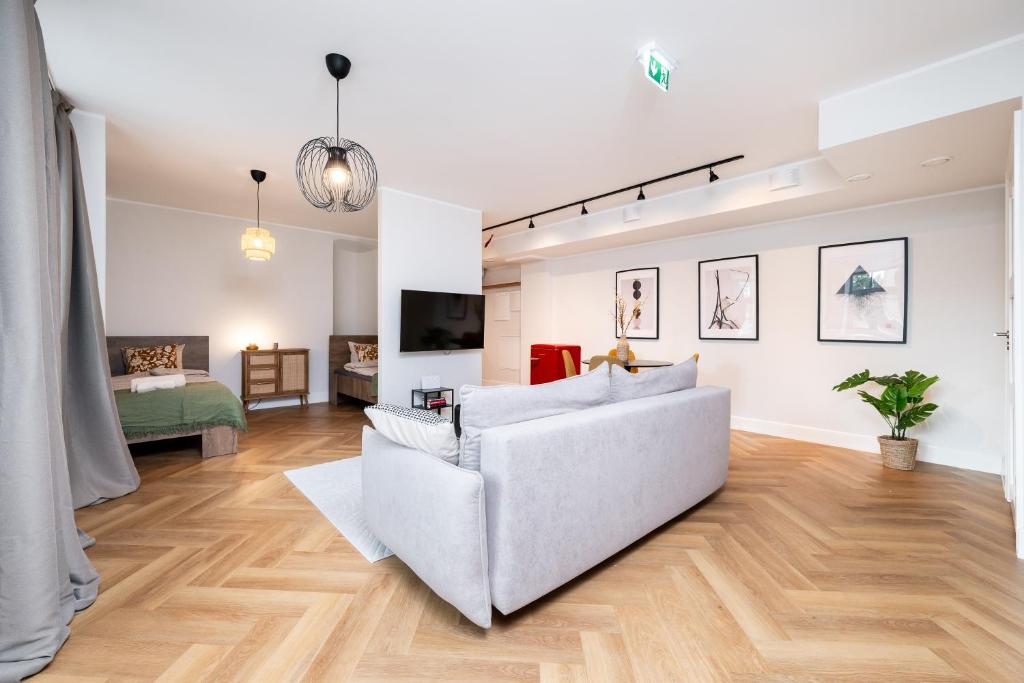 Postel nebo postele na pokoji v ubytování T64 apartments by SmartStay