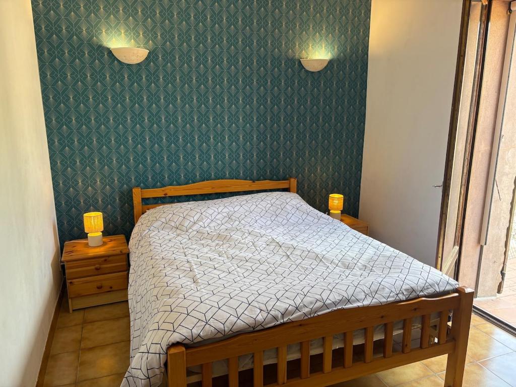 Ένα ή περισσότερα κρεβάτια σε δωμάτιο στο Appartement vue mer proche de la plage