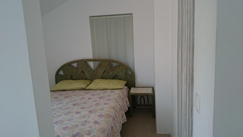 Posteľ alebo postele v izbe v ubytovaní Collins Apartments