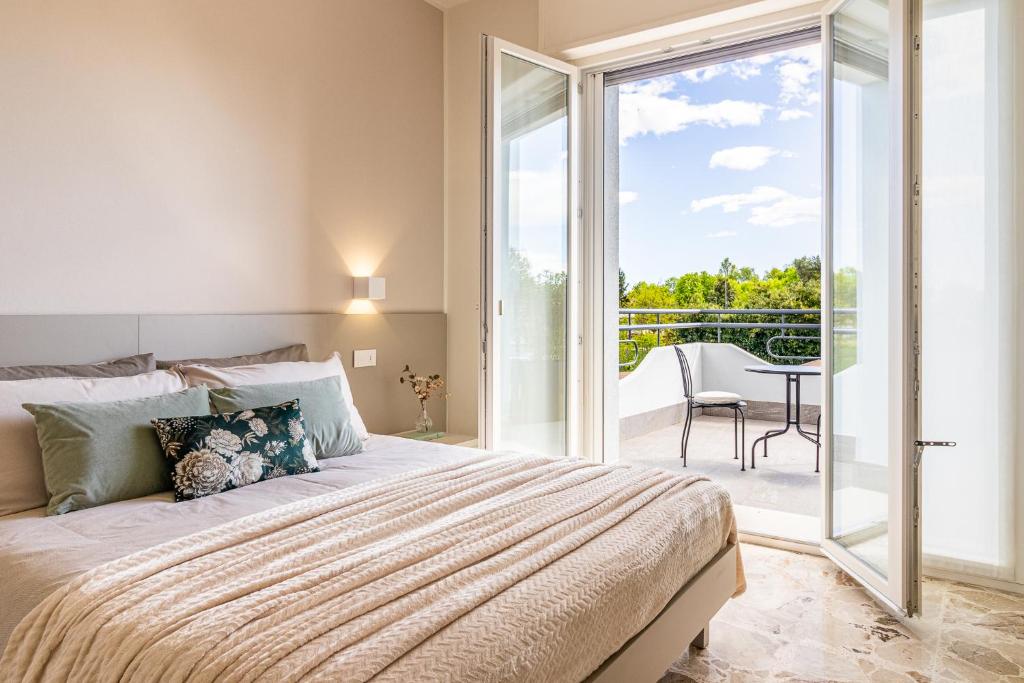 Ένα ή περισσότερα κρεβάτια σε δωμάτιο στο I'M b&b - Zona Aeroporto Internazionale Milano Malpensa