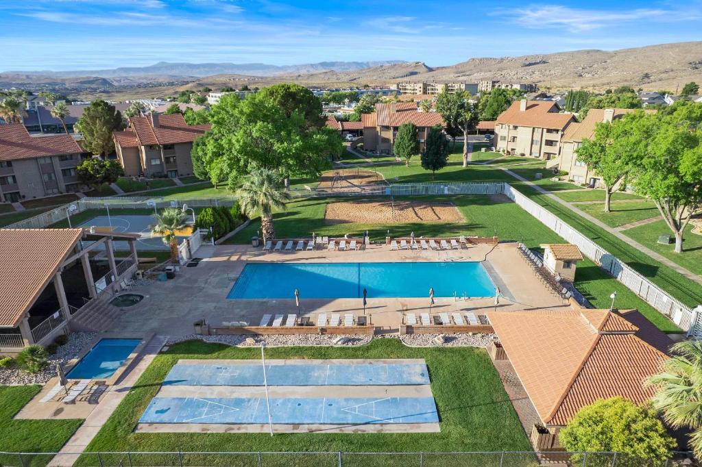 an aerial view of a resort with two swimming pools at Cozy Condo - Stay for 9 in St. George