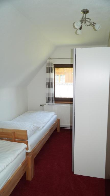Postel nebo postele na pokoji v ubytování Apartment Köll