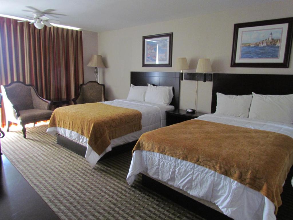 Postel nebo postele na pokoji v ubytování Romana Hotel - Houston Southwest