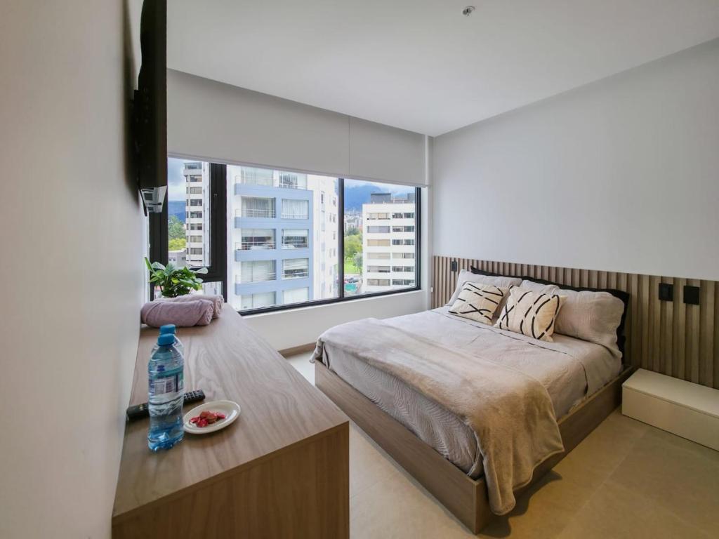 Postel nebo postele na pokoji v ubytování Studio en la mejor zona de Quito La Carolina