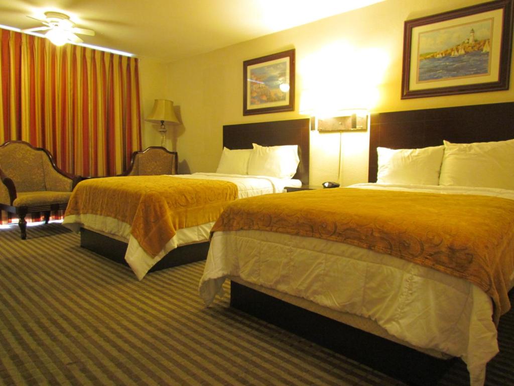 Postel nebo postele na pokoji v ubytování Romana Hotel - Houston Southwest