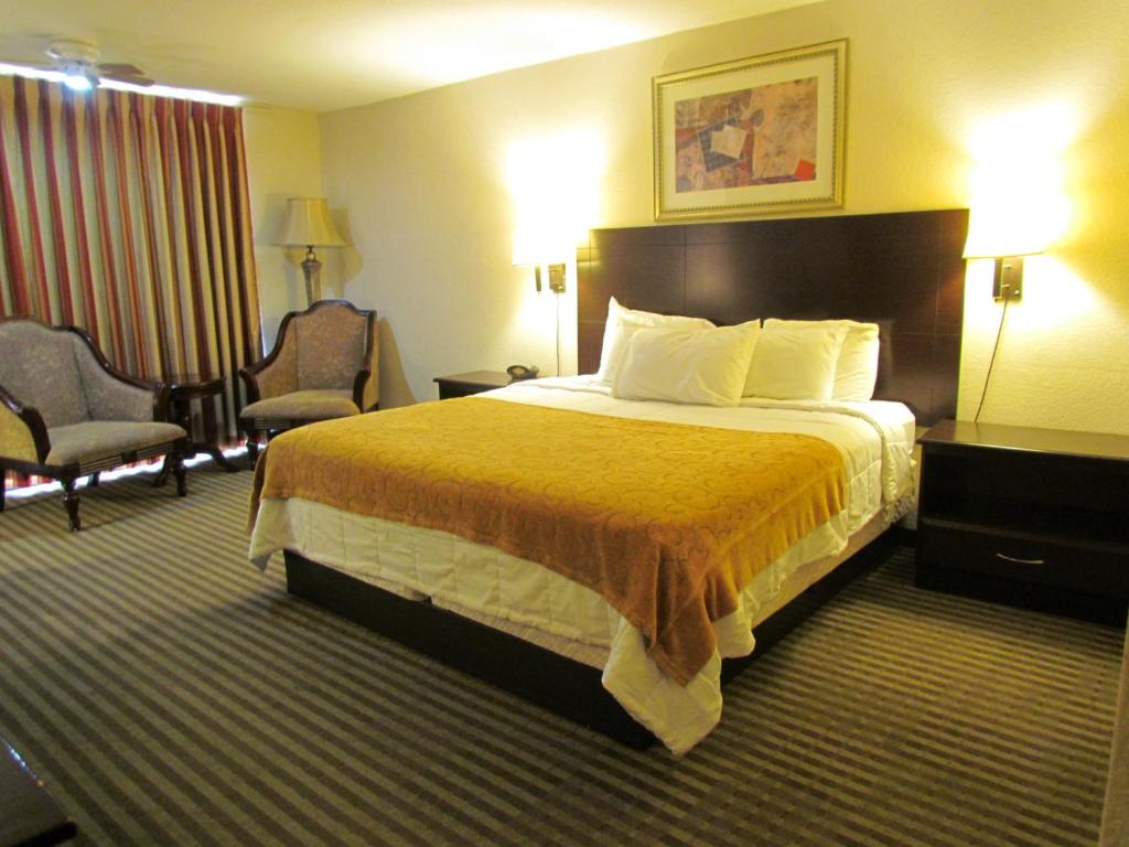 Postel nebo postele na pokoji v ubytování Romana Hotel - Houston Southwest
