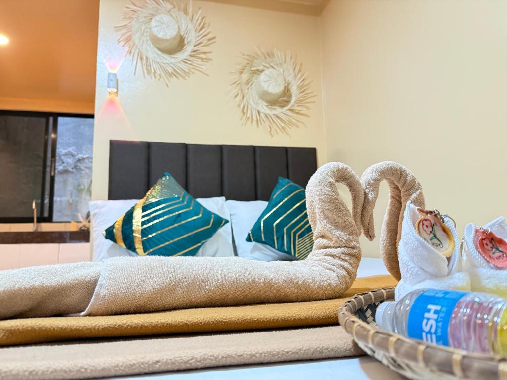 Cama o camas de una habitación en La Greta El Nido