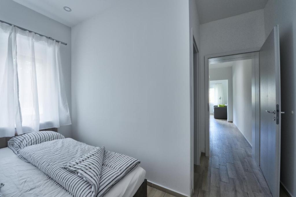 Łóżko lub łóżka w pokoju w obiekcie Villa Oliver 2 Siófok