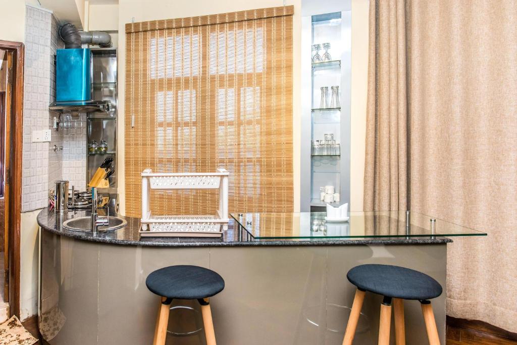 Una cocina o cocineta en Ratna Homes