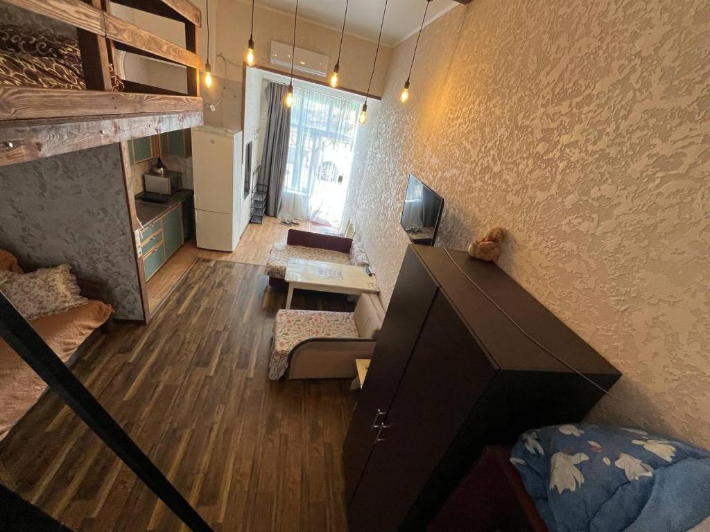 Postel nebo postele na pokoji v ubytování Студия лофт