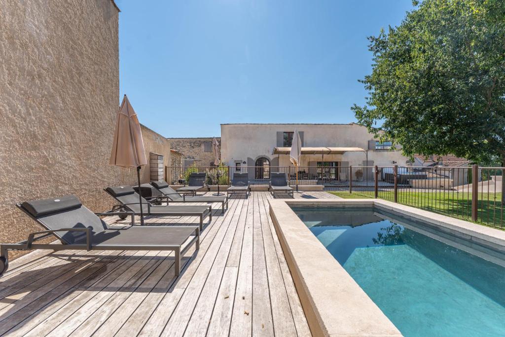 Swimmingpoolen hos eller tæt på Ferme La Clavière, Maison de vacances Lou Mas