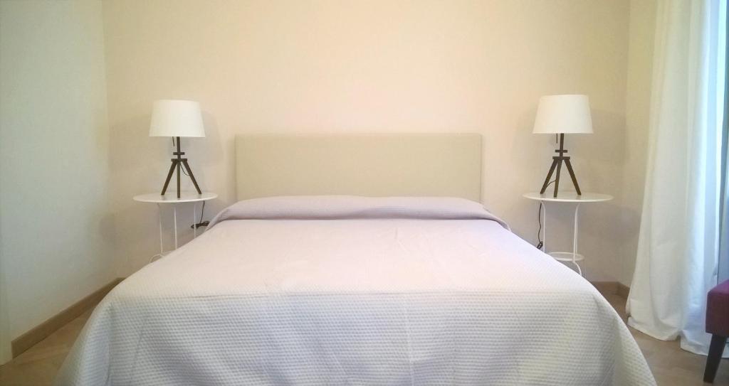 Postel nebo postele na pokoji v ubytování B&B Casa D'alleri