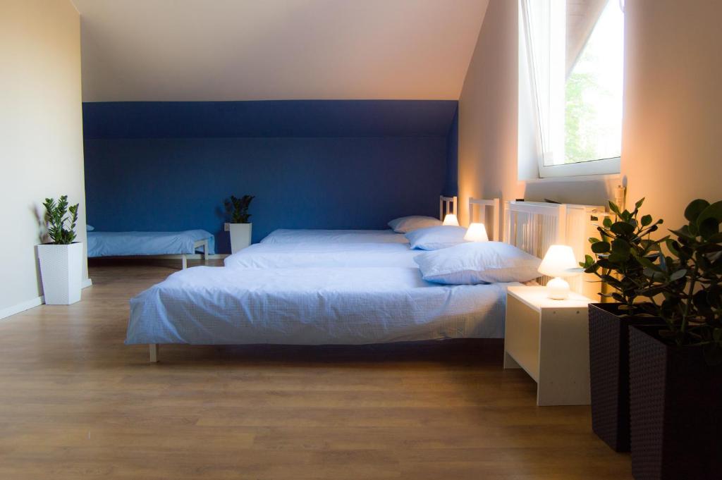 Postel nebo postele na pokoji v ubytování Smart Stay Hostel Gdynia
