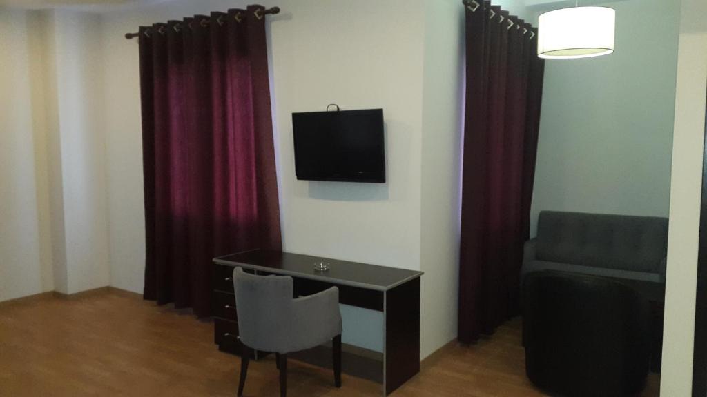 TV a/nebo společenská místnost v ubytování Hotel Alpet