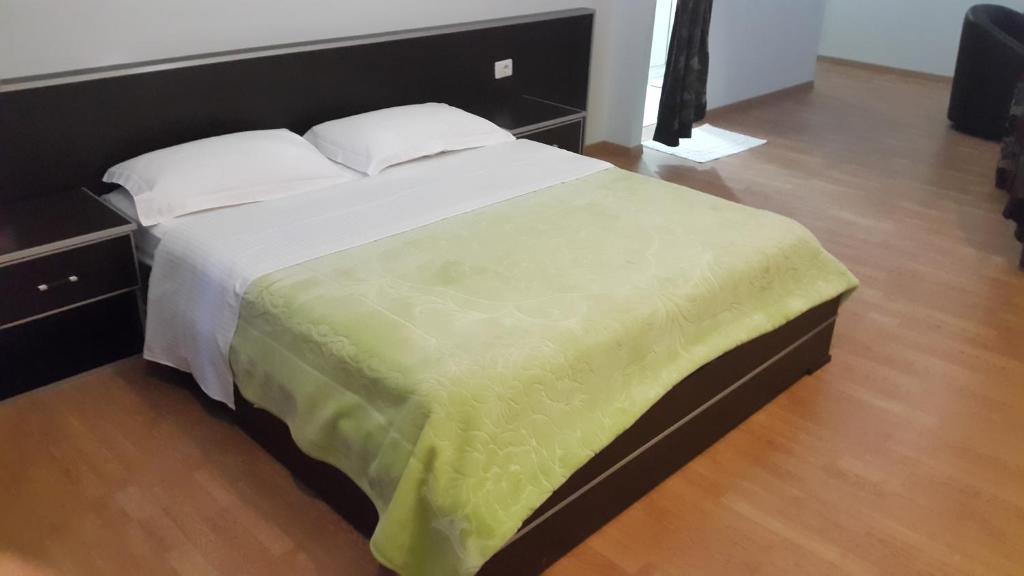Postel nebo postele na pokoji v ubytování Hotel Alpet
