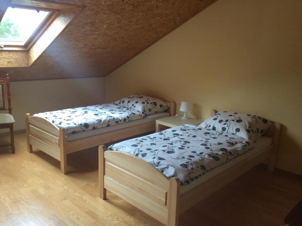 Posteľ alebo postele v izbe v ubytovaní Gdynia Orłowo Pokoje Gościnne u Stasia